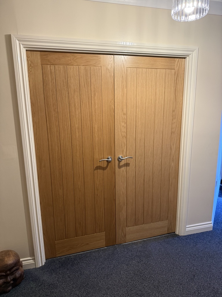 Internal oak French doors with glazed panels